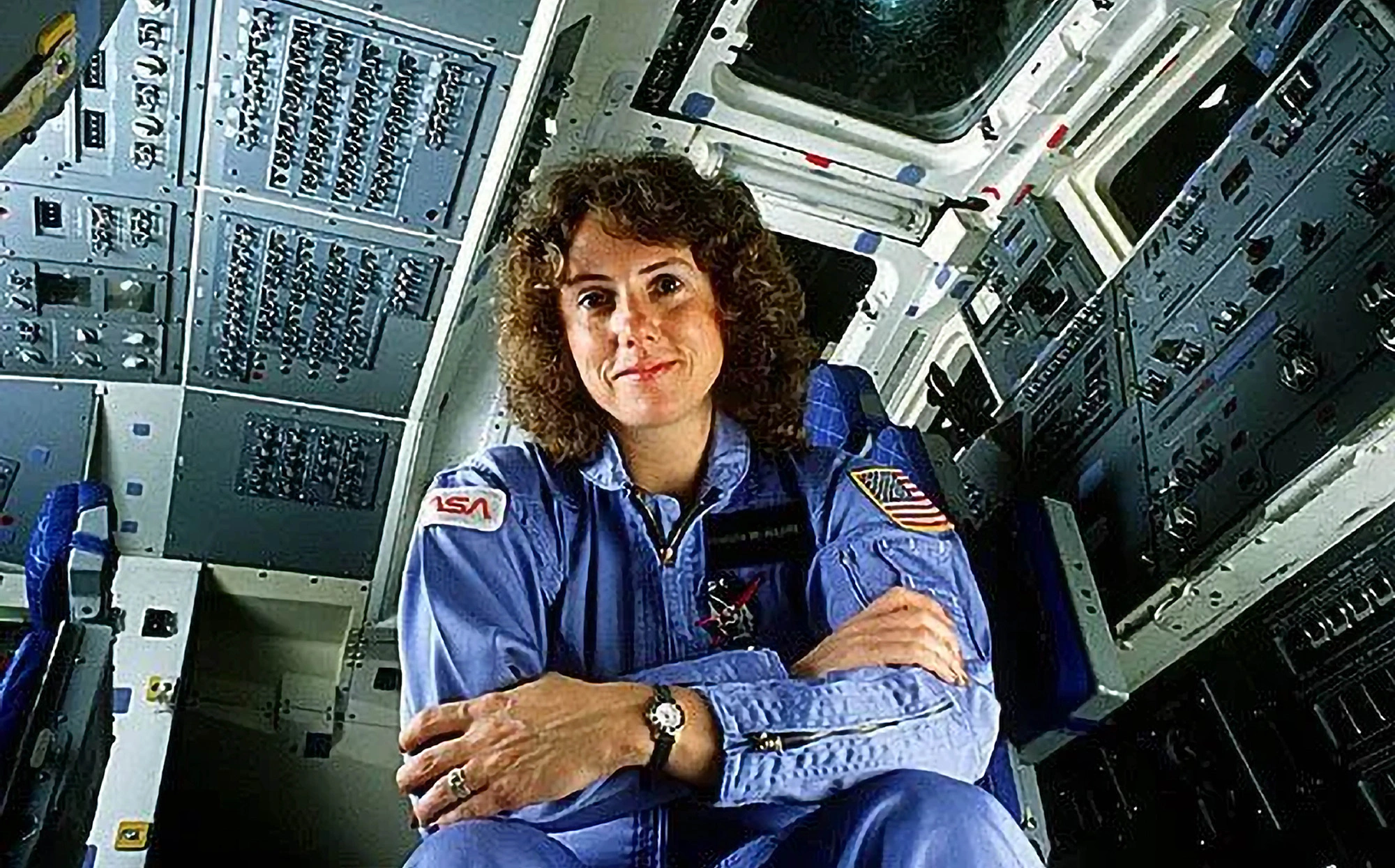 Astronaut Christa McAuliffe in a spacecraft